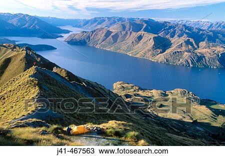 Mt. Roy campsite above Lake Wanaka. Autumn in central Otago. New Zealand. View Large Photo Image Stock Image - Mt. Roy campsite above Lake Wanaka. Autumn in central Otago. New Zealand.. Fotosearch