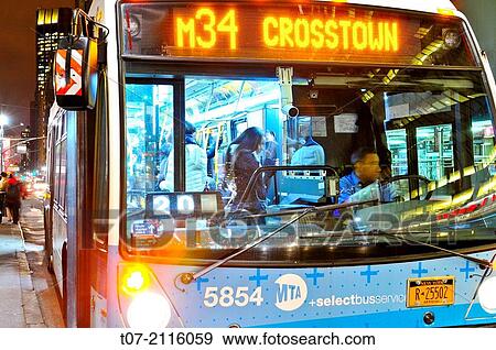 MTA M34 Bus, Public Transportion, Mass Transit, Metropolitan Transportation Authority, Public Transportation Buses, Mass Transit, Herald Square, 34th Street, Midtown Manhattan, New York City, USA. View Large Photo Image Stock Photo - MTA M34 Bus, Public Transportion, Mass Transit, Metropolitan Transportation Authority, Public Transportation Buses, Mass Transit, Herald Square, 34th Street, Midtown Manhattan, New York City, USA.. Fotosearch