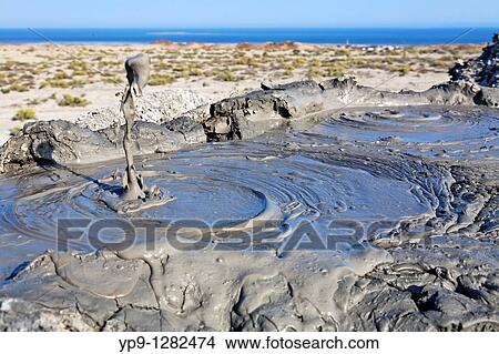 Picture - Mud erupting from a mud volcano, Qobustan, Azerbaijan. Fotosearch