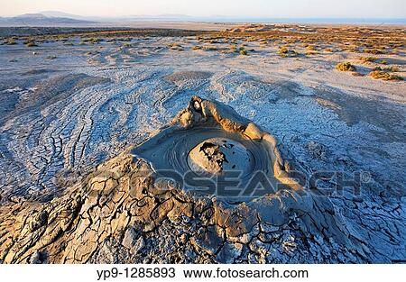 Stock Image - Mud erupting from a mud volcano, Qobustan, Azerbaijan. Fotosearch