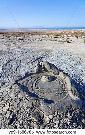 Mud erupting from a mud volcano, Qobustan, Azerbaijan View Large Photo Image Stock Photography - Mud erupting from a mud volcano, Qobustan, Azerbaijan. Fotosearch