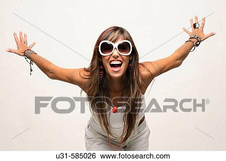 Stock Photograph - Mujer Adulta juguetea con la cBmara.. Fotosearch