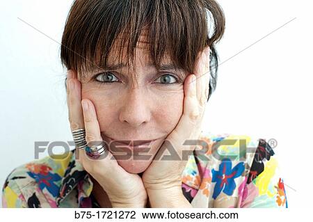 mujer con las manos en la cara preocupada, woman with her hands on face worried, View Large Photo Image Stock Image - mujer con las manos en la cara preocupada, woman with her hands on face worried,. Fotosearch