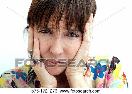 mujer con las manos en la cara preocupada, woman with her hands on face worried, View Large Photo Image Stock Image - mujer con las manos en la cara preocupada, woman with her hands on face worried,. Fotosearch