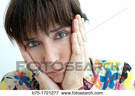 mujer con las manos en la cara preocupada, woman with her hands on face worried, View Large Photo Image Stock Photo - mujer con las manos en la cara preocupada, woman with her hands on face worried,. Fotosearch