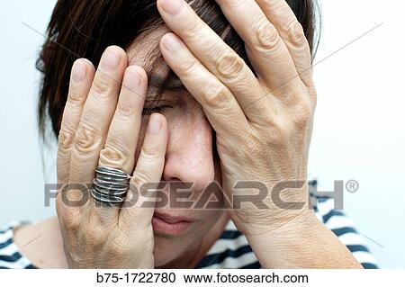mujer con las manos tapando la cara preocupada, woman with her hands covering her face worried, View Large Photo Image Stock Image - mujer con las manos tapando la cara preocupada, woman with her hands covering her face worried,. Fotosearch