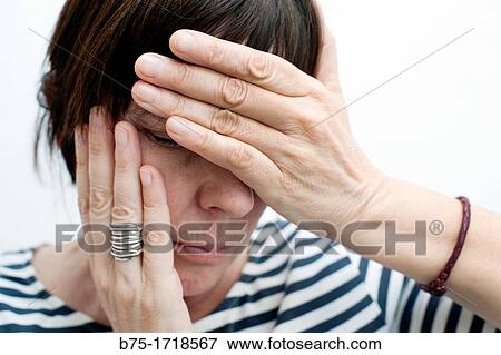 mujer con las manos tapando la cara preocupada, woman with her hands covering her face worried, View Large Photo Image Stock Photo - mujer con las manos tapando la cara preocupada, woman with her hands covering her face worried,. Fotosearch