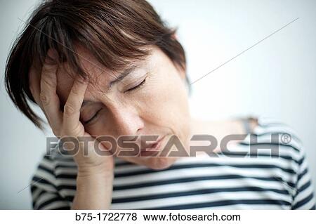mujer con las manos tapando la cara preocupada, woman with her hands covering her face worried, View Large Photo Image Stock Photo - mujer con las manos tapando la cara preocupada, woman with her hands covering her face worried,. Fotosearch