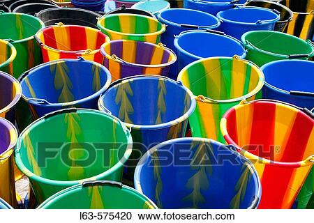 Multi-coloured buckets at market, Loropeni. Burkina Faso View Large Photo Image Stock Image - Multi-coloured buckets at market, Loropeni. Burkina Faso. Fotosearch