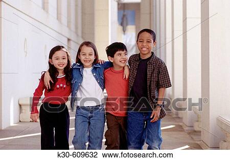 Stock Image - Multi-ethnic group of children walking together. Fotosearch