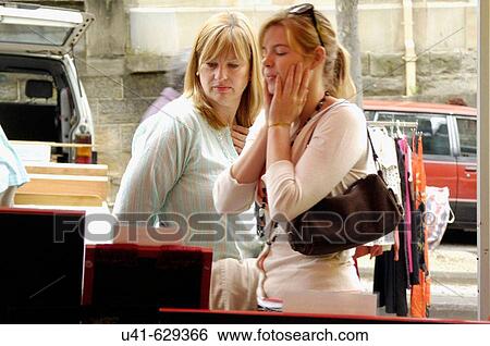 Stock Photograph - Mum and Daughter Market shopping.. Fotosearch