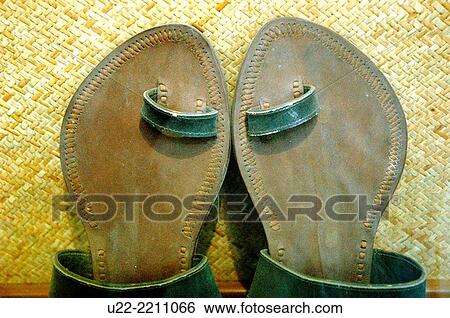 Stock Photograph - Mumbai, India: Gandhi's shoes at Mani Bhavan, Gandhi's home-museum. Fotosearch