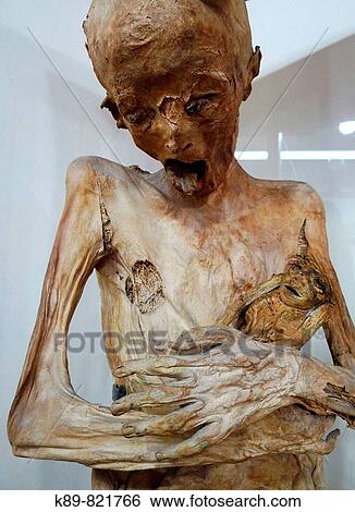 Stock Photograph - Mummy & Baby. Casa de los Muecos. Puebla, M? xico.. Fotosearch