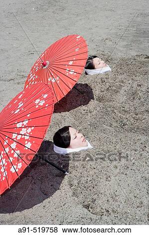 Municipal hot sand baths on the beach City of Ibusuki Island of Kyushu Japan View Large Photo Image Stock Photo - Municipal hot sand baths on the beach City of Ibusuki Island of Kyushu Japan. Fotosearch