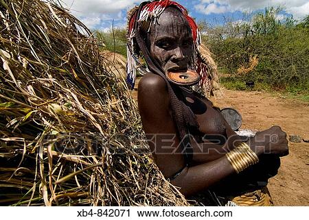 Mursi ethnic group, Mago National Park, Omo valley, Ethiopia View Large Photo Image Stock Image - Mursi ethnic group, Mago National Park, Omo valley, Ethiopia. Fotosearch