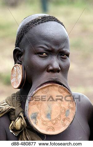 Mursi woman. Omo valley tribe. South Ethiopia. View Large Photo Image Stock Photo - Mursi woman. Omo valley tribe. South Ethiopia.. Fotosearch