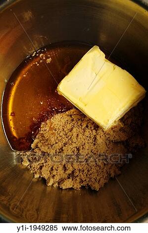 Muscovado sugar, butter and honey melting in a pan. View Large Photo Image Stock Photography - Muscovado sugar, butter and honey melting in a pan.. Fotosearch