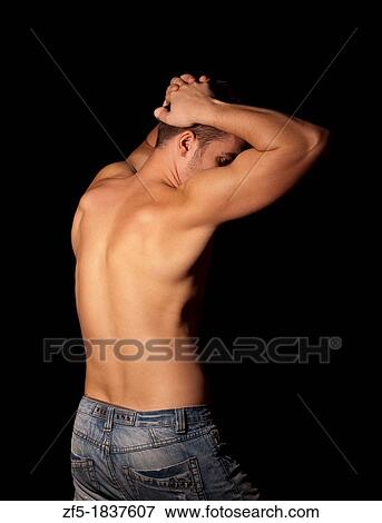 Muscular young man View Large Photo Image Stock Photo - Muscular young man. Fotosearch