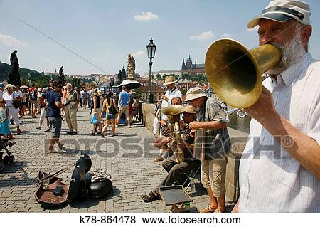 Music band playing on Charles Bridge, Prague, Czech Republic View Large Photo Image Stock Photo - Music band playing on Charles Bridge, Prague, Czech Republic. Fotosearch