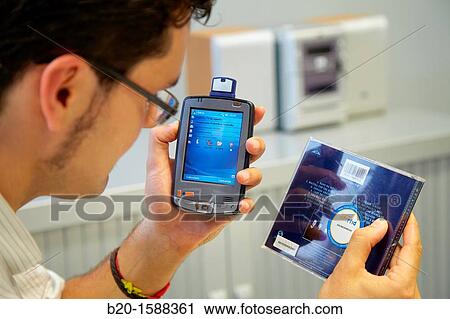 Stock Image - Music CD identification via NFC. Fotosearch