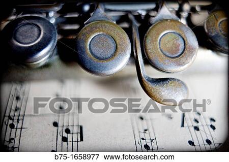 Stock Photo - Music, musical instrument, flute, score. Fotosearch
