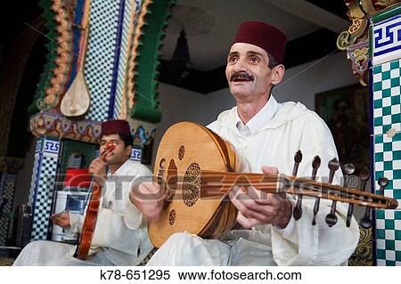 Musicians playing at Marhaba Palace, a luxurious palace restaurant in the old town. Tangier. Morocco View Large Photo Image Stock Photography - Musicians playing at Marhaba Palace, a luxurious palace restaurant in the old town. Tangier. Morocco. Fotosearch