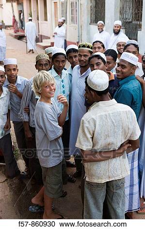 Muslim boys talk to a tourist in Galle Fort, Sri Lanka View Large Photo Image Stock Image - Muslim boys talk to a tourist in Galle Fort, Sri Lanka. Fotosearch