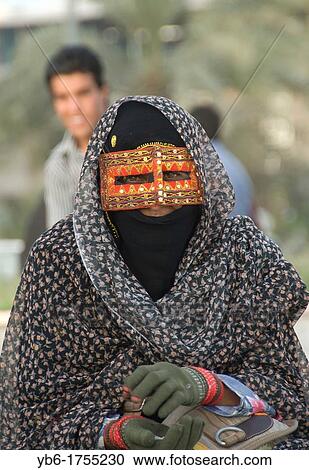 Muslim Woman in Hijab and wearing a traditional mask, Bandar Abbas, Iran View Large Photo Image Stock Image - Muslim Woman in Hijab and wearing a traditional mask, Bandar Abbas, Iran. Fotosearch