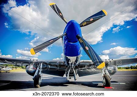 Mustang airplane showing bright, dramatic colors and deep blue cloudy sky. Easton Maryland USA View Large Photo Image Stock Image - Mustang airplane showing bright, dramatic colors and deep blue cloudy sky. Easton Maryland USA. Fotosearch