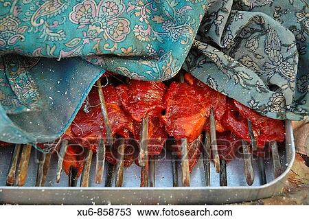 Stock Image - Mutton shish kabobs for sale in Leh, Ladakh, India. Fotosearch