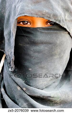 Stock Photo - Muzeina tribe bedouin girl - Wadi Arada desert - Sinai Peninsula, Egypt.. Fotosearch