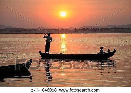 Myanmar, Burma, Mandalay, Ayeyarwady River, fishermen, boat, sunset, View Large Photo Image Stock Photo - Myanmar, Burma, Mandalay, Ayeyarwady River, fishermen, boat, sunset,. Fotosearch
