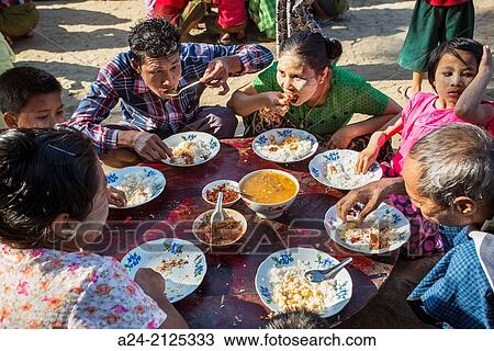 Myanmar, near Mandalay, Sagaing City, Free distributed food. View Large Photo Image Stock Image - Myanmar, near Mandalay, Sagaing City, Free distributed food.. Fotosearch
