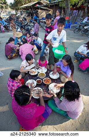 Myanmar, near Mandalay, Sagaing City, Free distributed food. View Large Photo Image Stock Image - Myanmar, near Mandalay, Sagaing City, Free distributed food.. Fotosearch