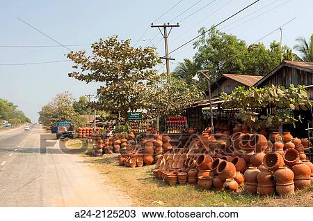Myanmar, Pegu province, road side pottery shop. View Large Photo Image Stock Image - Myanmar, Pegu province, road side pottery shop.. Fotosearch
