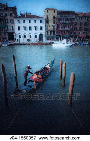 Mystical view of a gondola with gondolier in Venice, Italy, Europe View Large Photo Image Stock Photo - Mystical view of a gondola with gondolier in Venice, Italy, Europe. Fotosearch