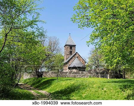 Nagyboerzsoeny, an idyllic former mining village in northern Hungary. The romanic curch dedicated to Saint Stephen. Europe, Eastern Europe, Hungary, Northern Hungary, April. View Large Photo Image Stock Photo - Nagyboerzsoeny, an idyllic former mining village in northern Hungary. The romanic curch dedicated to Saint Stephen. Europe, Eastern Europe, Hungary, Northern Hungary, April.. Fotosearch