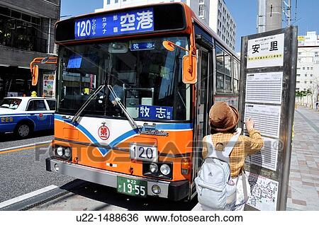 Stock Photograph - Naha (Japan): bus stop along Kokusai-dori. Fotosearch