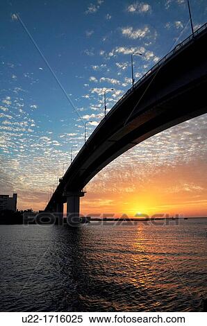 Stock Photography - Naha Japan: sunset at Tomari Wharf. Fotosearch