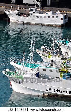 Naha, Okinawa, Japan, fishing boats at Tomari Wharf View Large Photo Image Stock Image - Naha, Okinawa, Japan, fishing boats at Tomari Wharf. Fotosearch