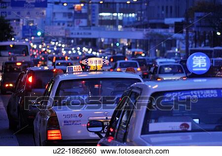 Naha, Okinawa, Japan, taxis and other cars along the Route 58 at night View Large Photo Image Stock Image - Naha, Okinawa, Japan, taxis and other cars along the Route 58 at night. Fotosearch