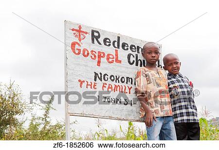 Nairobi Kenya Africa Salama metal building church Redeemed Gospel in Ngokomi with two young boys portrait View Large Photo Image Stock Photograph - Nairobi Kenya Africa Salama metal building church Redeemed Gospel in Ngokomi with two young boys portrait. Fotosearch