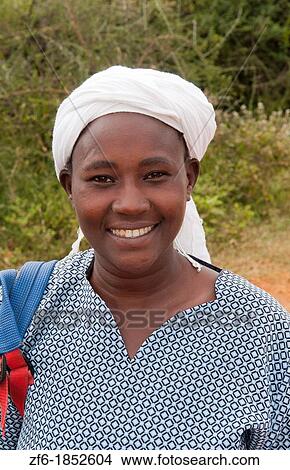 Nairobi Kenya Africa woman portait smiling near Salama at church with scarf View Large Photo Image Picture - Nairobi Kenya Africa woman portait smiling near Salama at church with scarf. Fotosearch