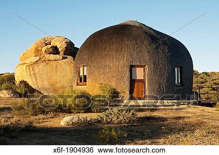 Namakwa Mountain Suite in the morning light, oversized thatched, dome-shaped accommodation resembling the traditional huts of the local Nama tribe, Naries Namakwa Retreat, Naries, South Africa View Large Photo Image Stock Photograph - Namakwa Mountain Suite in the morning light, oversized thatched, dome-shaped accommodation resembling the traditional huts of the local Nama tribe, Naries Namakwa Retreat, Naries, South Africa. Fotosearch