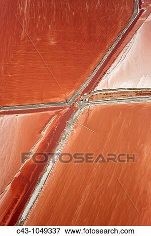 Namibia - Aerial view of saline water at the salt works of Walvis Bay between Namib Desert and Atlantic Ocean View Large Photo Image Stock Photo - Namibia - Aerial view of saline water at the salt works of Walvis Bay between Namib Desert and Atlantic Ocean. Fotosearch