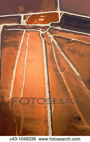 Namibia - Aerial view of saline water at the salt works of Walvis Bay between Namib Desert and Atlantic Ocean View Large Photo Image Stock Photograph - Namibia - Aerial view of saline water at the salt works of Walvis Bay between Namib Desert and Atlantic Ocean. Fotosearch