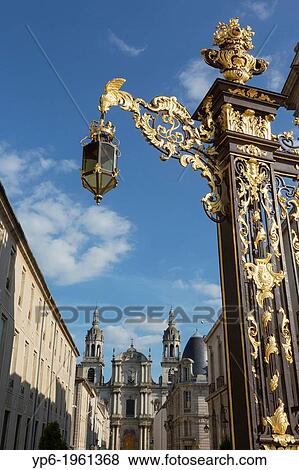 Stock Photo - Nancy Cathedral and latern with golden ornaments, Nancy, Meurthe-et-Moselle, France.. Fotosearch