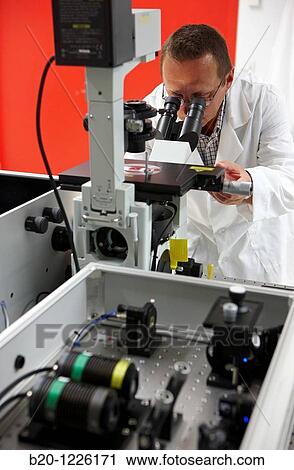Nanophotonics laboratory, confocal fluorescence microscope with molecular sensitivity, Materials Physics Center is a joint center of the Spanish Scientific Research Council CSIC and the University of the Basque Country UPV/EHU. View Large Photo Image Stock Image - Nanophotonics laboratory, confocal fluorescence microscope with molecular sensitivity, Materials Physics Center is a joint center of the Spanish Scientific Research Council CSIC and the University of the Basque Country UPV/EHU.. Fotosearch