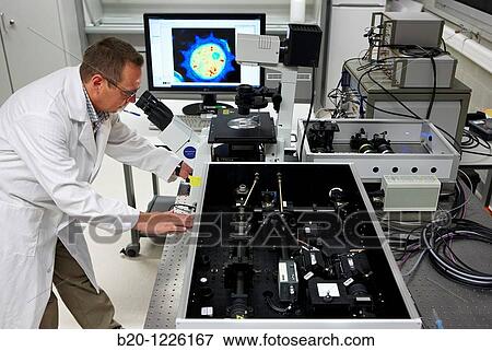 Stock Photo - Nanophotonics laboratory, confocal fluorescence microscope with molecular sensitivity, Materials Physics Center is a joint center of the Spanish Scientific Research Council CSIC and the University of the Basque Country UPV/EHU.. Fotosearch