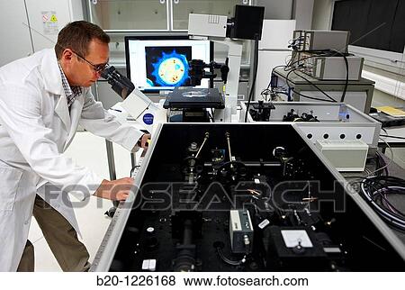 Stock Photo - Nanophotonics laboratory, confocal fluorescence microscope with molecular sensitivity, Materials Physics Center is a joint center of the Spanish Scientific Research Council CSIC and the University of the Basque Country UPV/EHU.. Fotosearch
